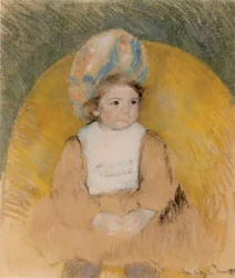 Jeune fille assise dans un fauteuil jaune